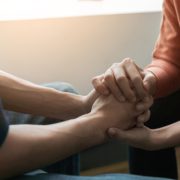 receiving mental health care while holding hands