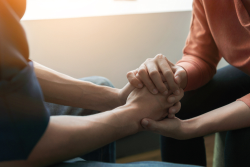 receiving mental health care while holding hands